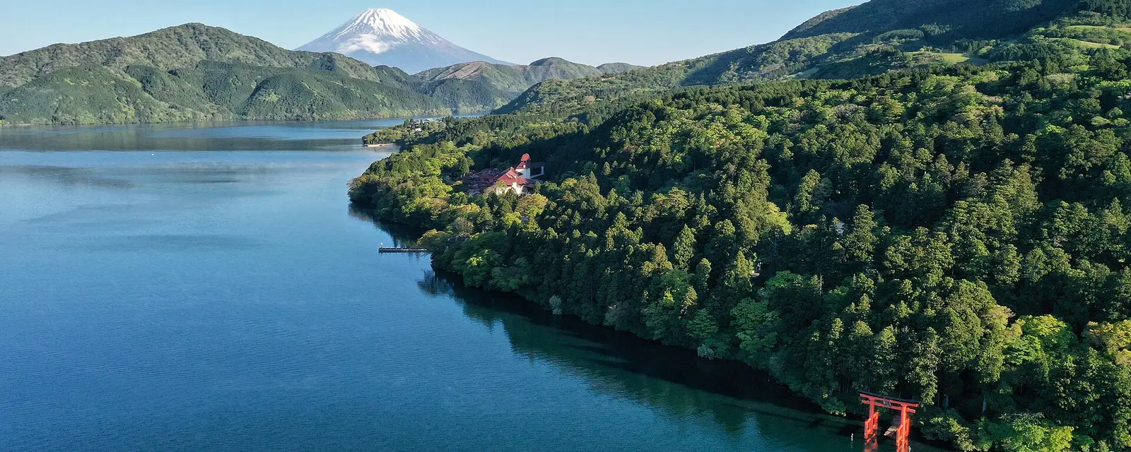 Lake Ashi with Mount Fuji and the red torii gate of Hakone Shrine